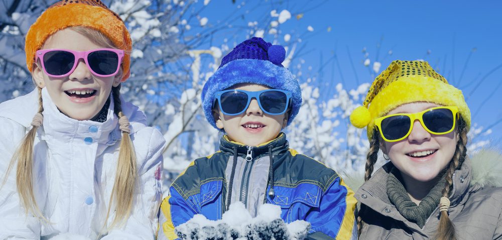 bambini durante vacanze sulla neve a livigno